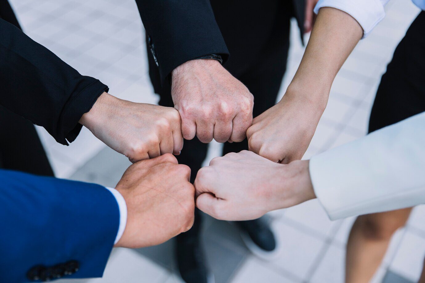 business-team-concept-with-fists_23-2147707161